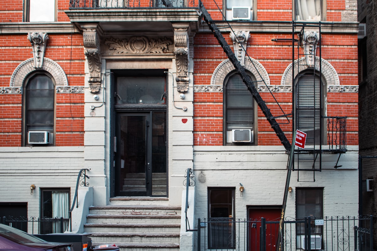 NYC apartment building on a residential street